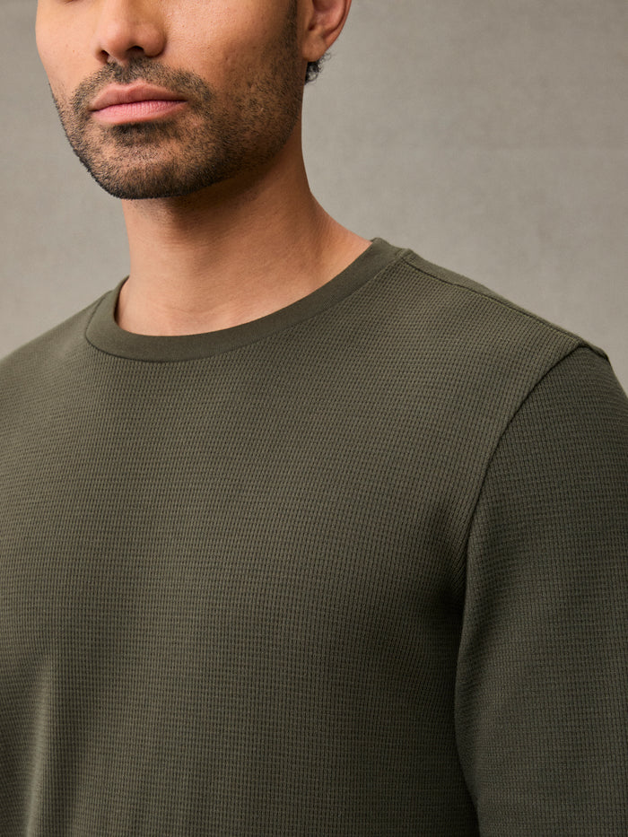 A waffle flannel with a classic crewneck. 60% cotton / 40% recycled poly for lasting durability. Machine washable, no special care needed.