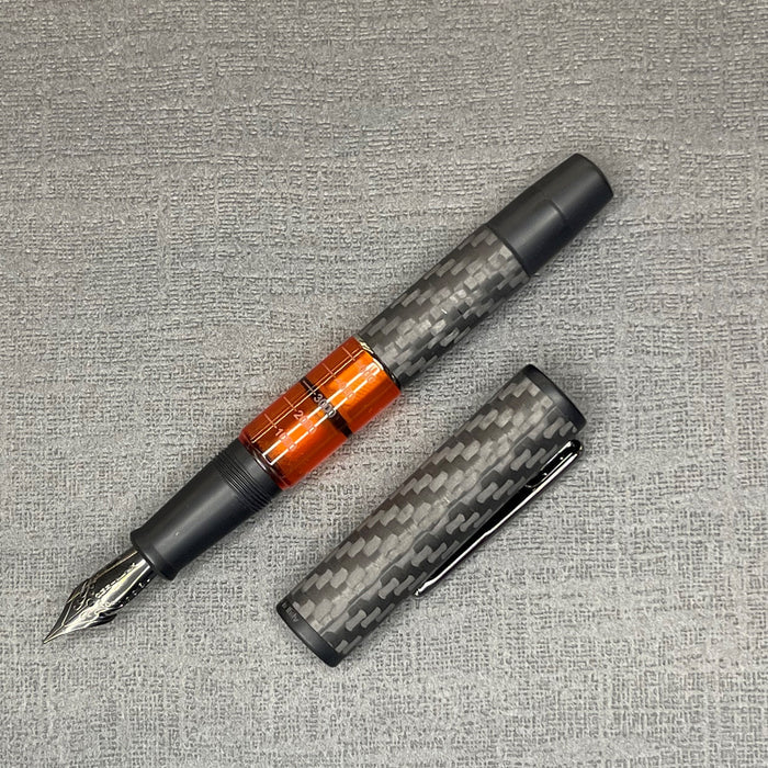 Conklin Carbon Fiber Stealth Word Gauge Fountain Pen - Orange | Atlas Stationers.