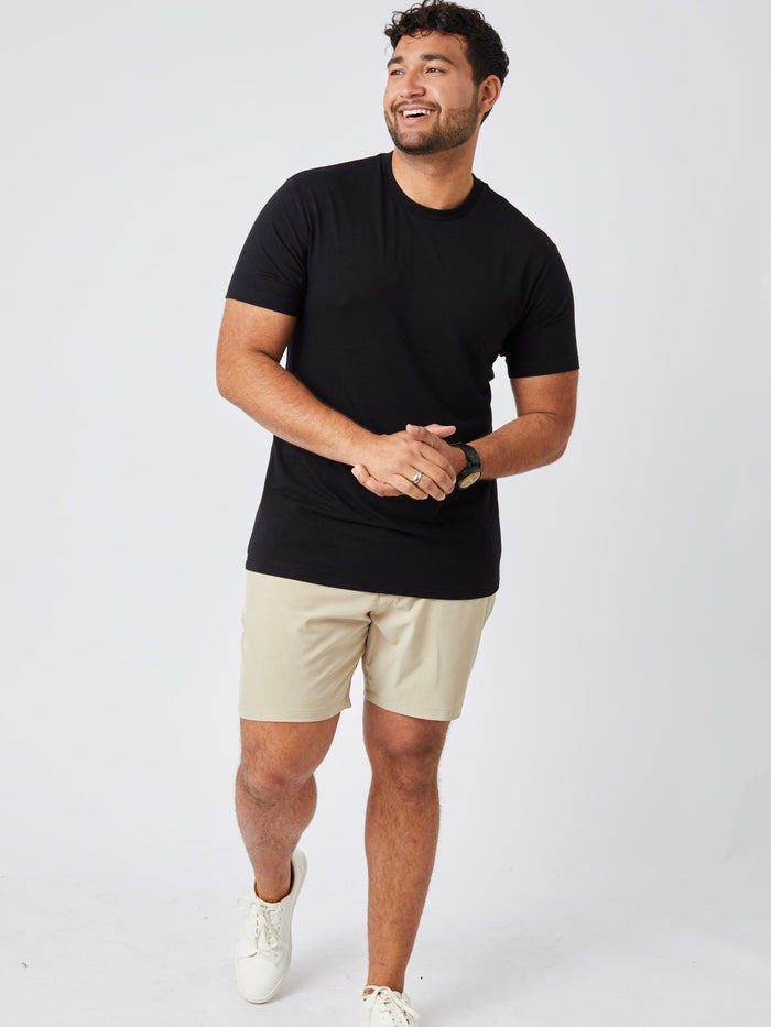 Matheus is 6', 210LBS and wears a size XL # Tall All Black Performance Crew 5-pack Studio Front Model Size XL | Fresh Clean Threads