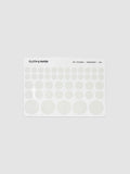 One sheet of transparent dot stickers with letters design in small, medium, and large sizes shown against a neutral background.
