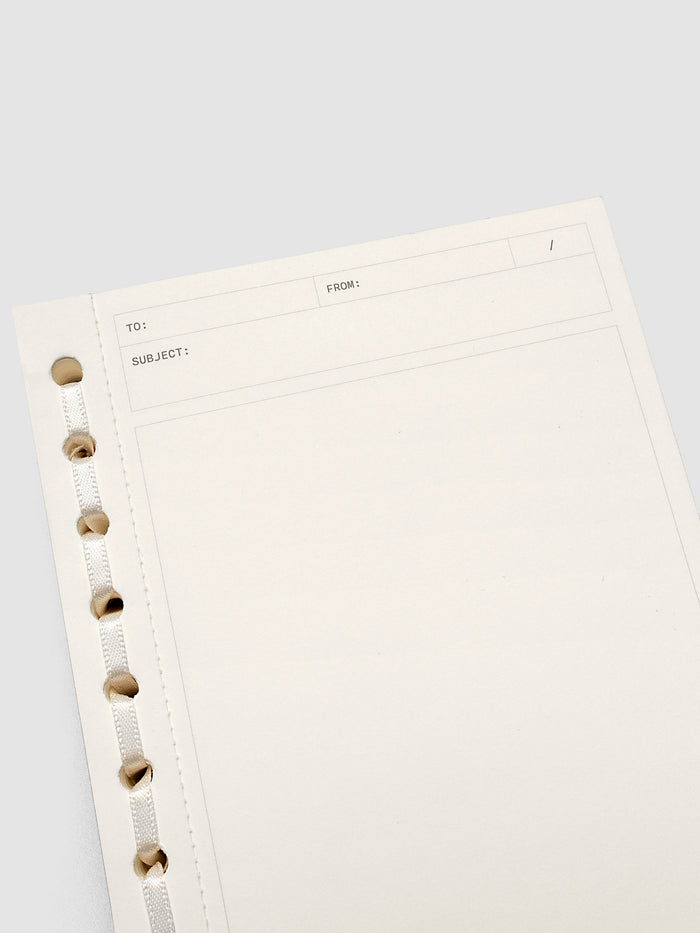 Close up of the Message Pad showing headers for to, from, date, and subject.