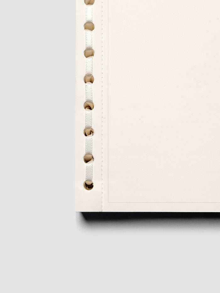 Close up of the ribbon binding on the Message Pad.