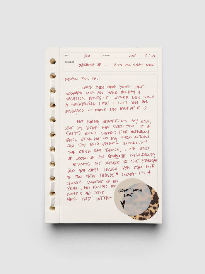 Message Pad shown with red handwritten notes and page flags.