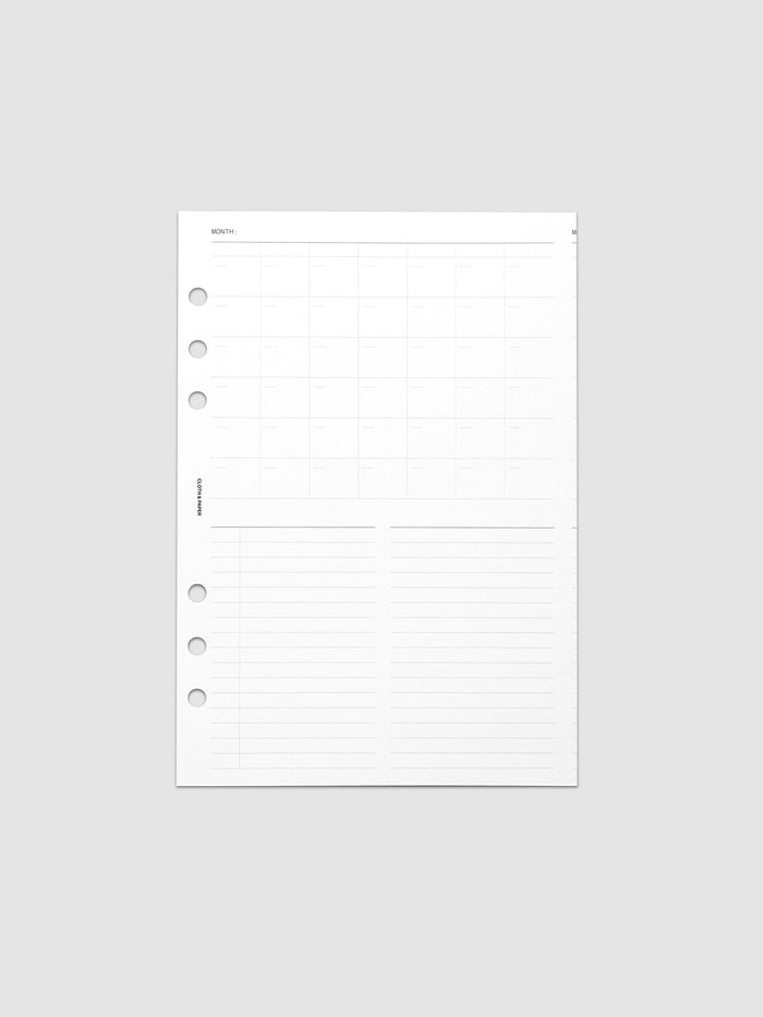 Monthly Fold Out Planner Insert Set of 2, A5 6-Ring Punch, one white insert folded closed and photographed flat and straight on, six round punch holes down the left edge