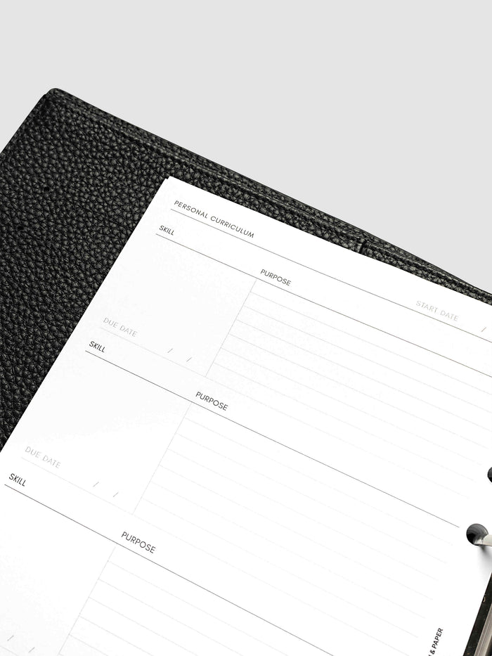 Close-up at an angle of the index page of the A5 6-Ring Punch Personal Curriculum Planner Inserts, showing the repeating skill, purpose and due date entries under a start date