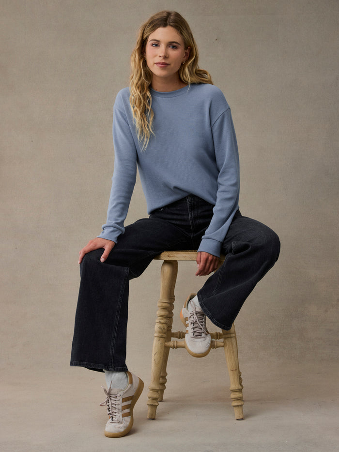 Cut with a relaxed drop shoulder instead of a tight crew fit, this soft Skyline blue thermal skims the body without clinging, so it looks as good under a blazer as it does with jeans